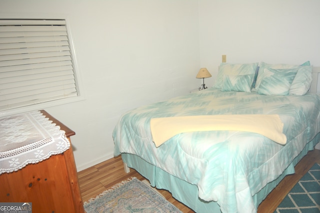 bedroom featuring hardwood / wood-style floors