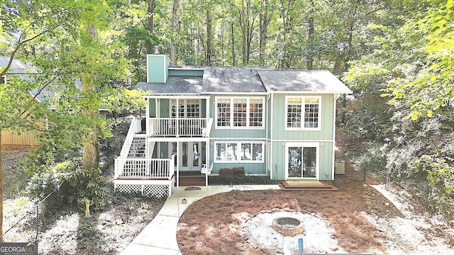 view of front facade with an outdoor fire pit