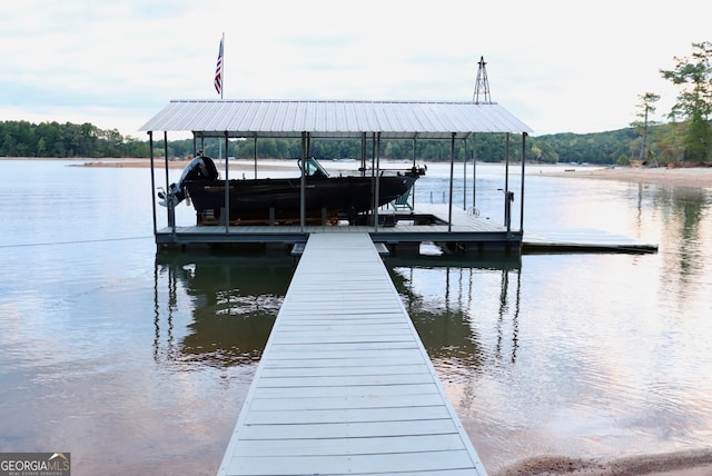 dock area with a water view