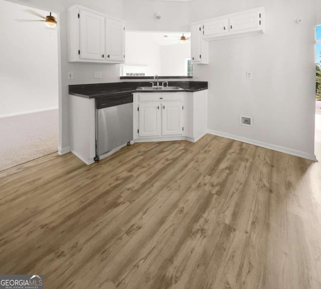 kitchen featuring dishwasher, white cabinetry, sink, and ceiling fan