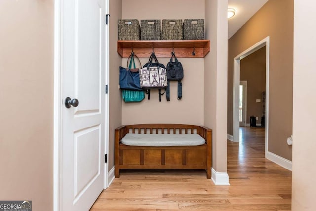 mudroom with light hardwood / wood-style flooring