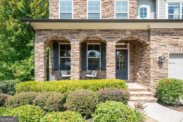 property entrance featuring a garage