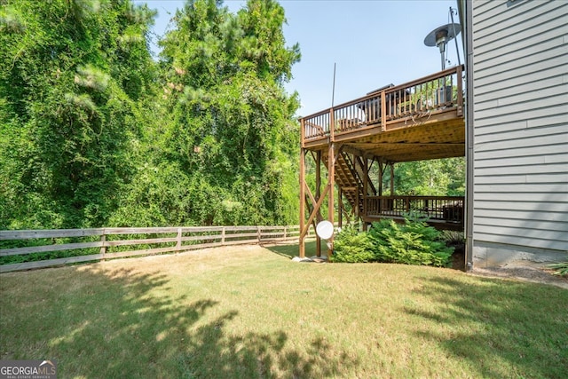 view of yard featuring a wooden deck