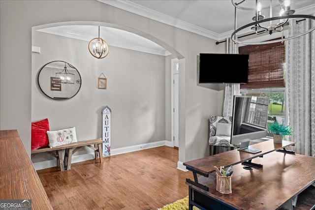 office featuring crown molding, an inviting chandelier, and wood-type flooring