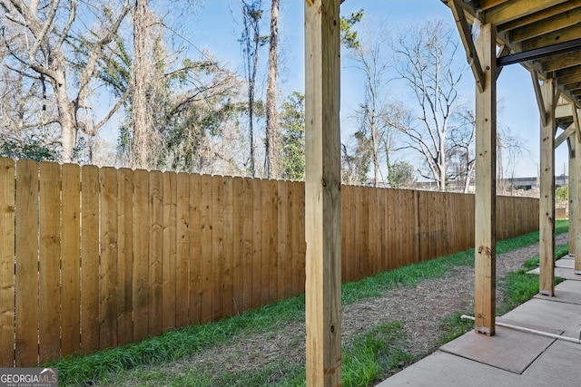 view of yard with fence