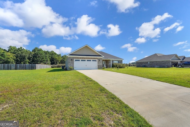 single story home featuring a garage and a front lawn