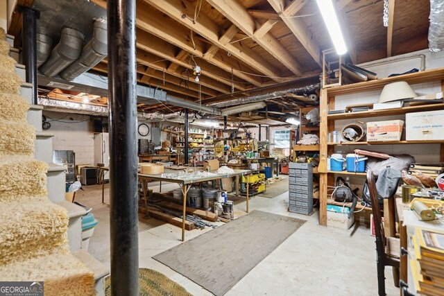 basement with a workshop area