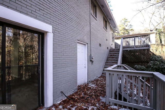 view of home's exterior featuring a wooden deck