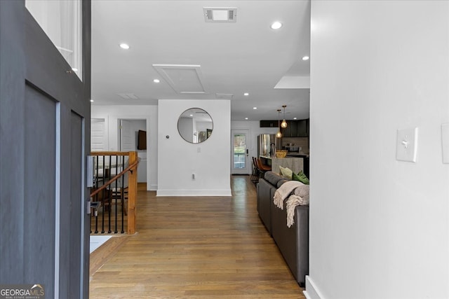 interior space with hardwood / wood-style floors