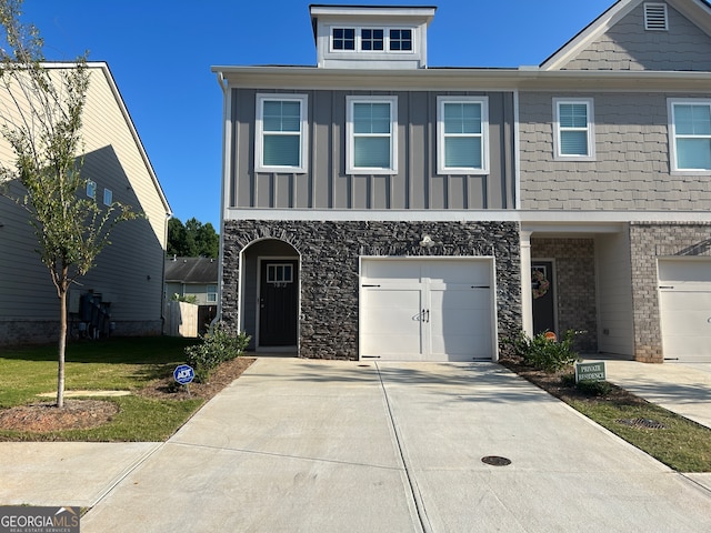 view of front of property with a garage