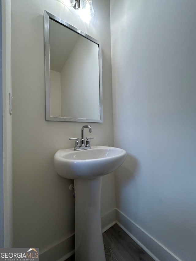 bathroom featuring hardwood / wood-style flooring