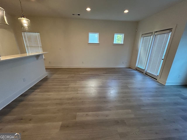 empty room featuring hardwood / wood-style flooring