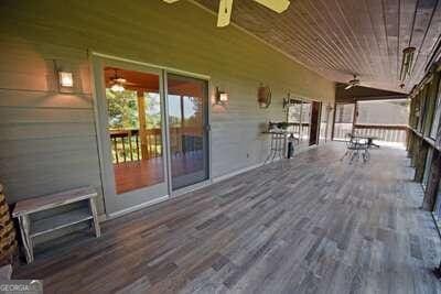 wooden terrace with ceiling fan