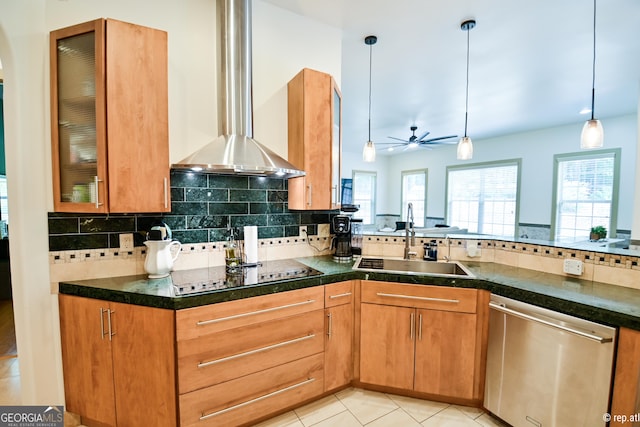 kitchen with decorative backsplash, wall chimney exhaust hood, sink, dishwasher, and hanging light fixtures