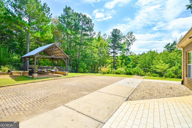 view of patio / terrace with a gazebo and an outdoor living space