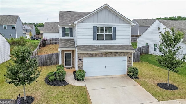 view of front of property with a front lawn and a garage