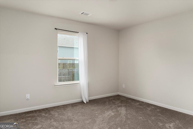 view of carpeted spare room