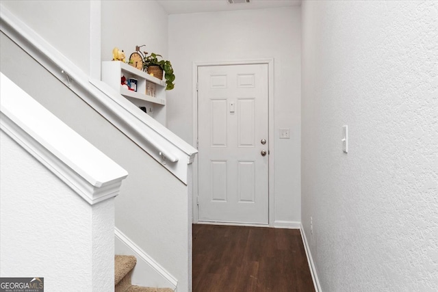 interior space featuring dark wood-type flooring