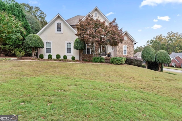 view of front facade with a front yard