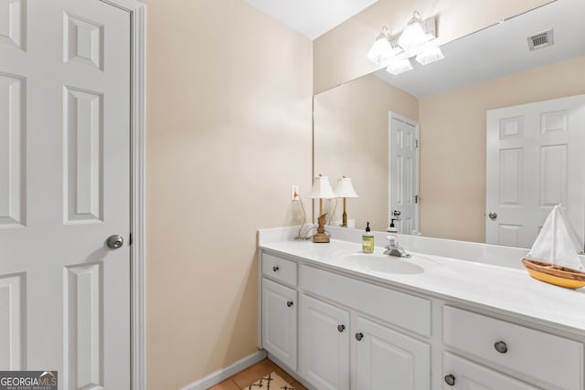 bathroom with vanity and tile patterned floors