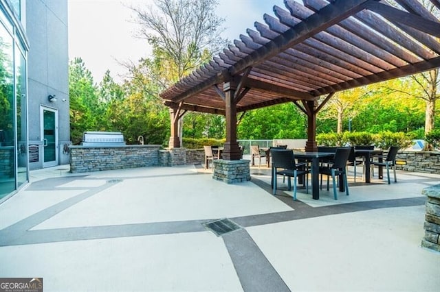 view of patio / terrace featuring a pergola and area for grilling