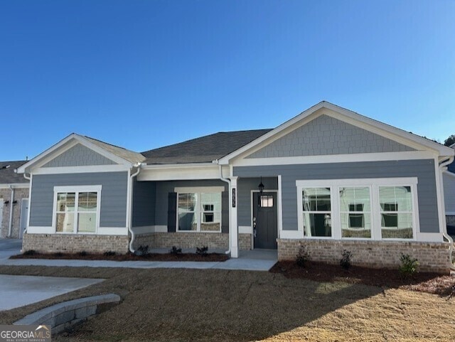 craftsman inspired home featuring a porch