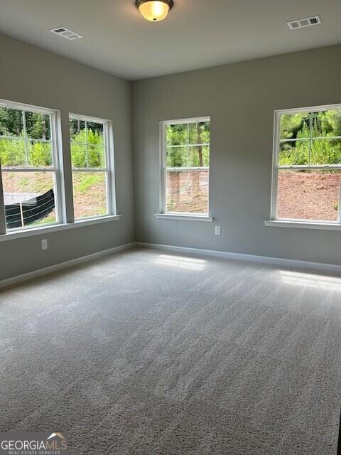 empty room with carpet floors