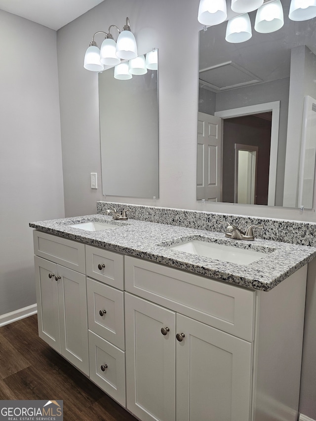 bathroom featuring vanity and hardwood / wood-style floors