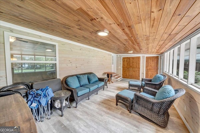 sunroom / solarium featuring wooden ceiling