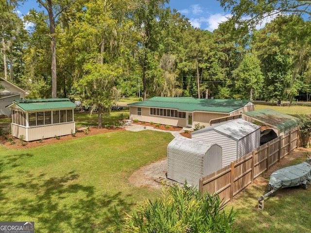 view of yard with a sunroom