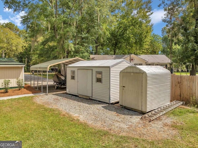 view of outdoor structure featuring a lawn and a carport