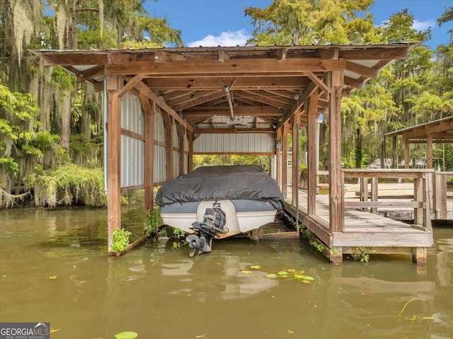 view of dock with a water view