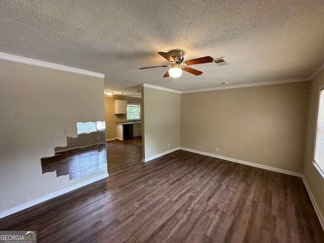 interior space with ornamental molding, dark wood-type flooring, a textured ceiling, and ceiling fan