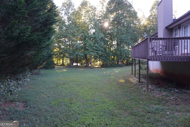 view of yard featuring a deck