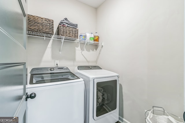 laundry area featuring separate washer and dryer