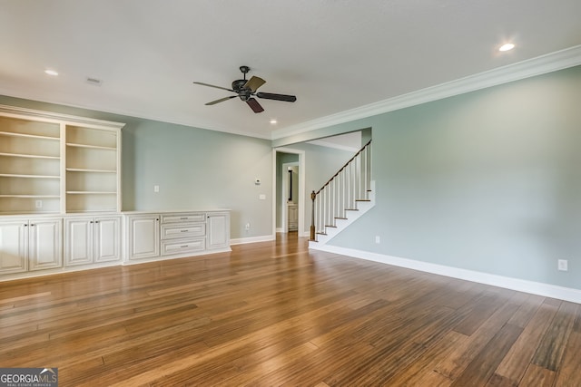 unfurnished room with light wood-type flooring, ceiling fan, and ornamental molding