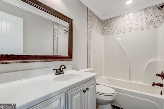 full bathroom featuring ornamental molding, vanity, toilet, and shower / tub combination