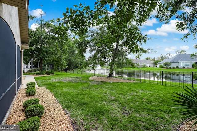 view of yard featuring a water view