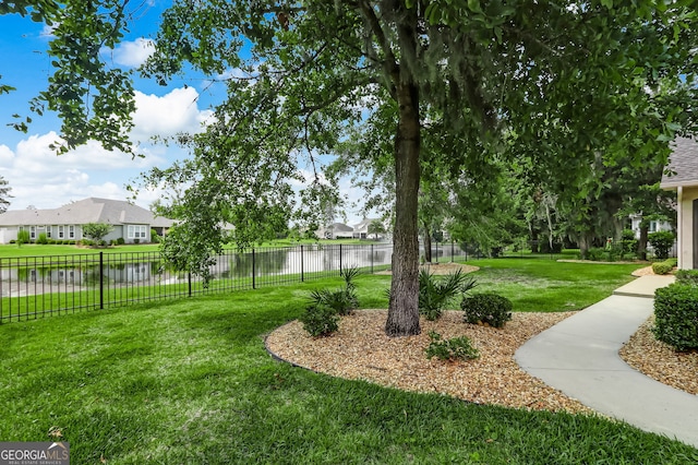 view of yard with a water view