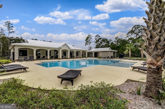 view of pool with a patio