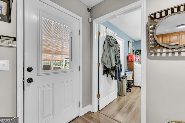 doorway to outside featuring light hardwood / wood-style flooring