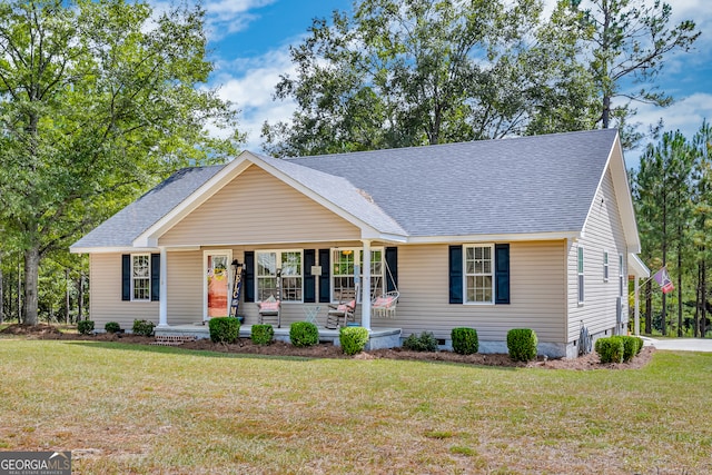 single story home with a porch and a front lawn