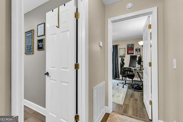 hall featuring light wood-type flooring