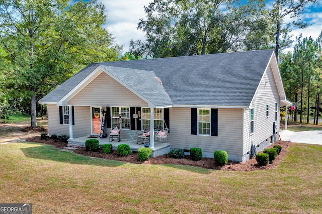 view of front of home with a porch and a front lawn