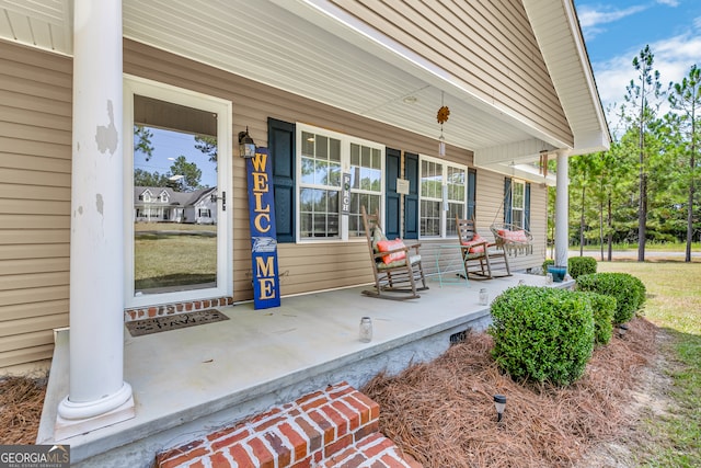 property entrance with a porch