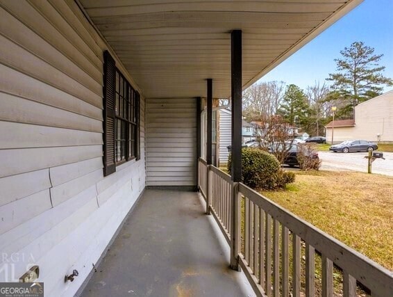 balcony featuring a porch