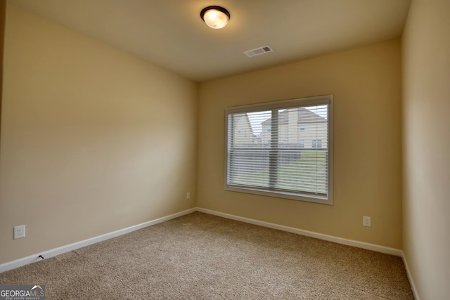 view of carpeted spare room