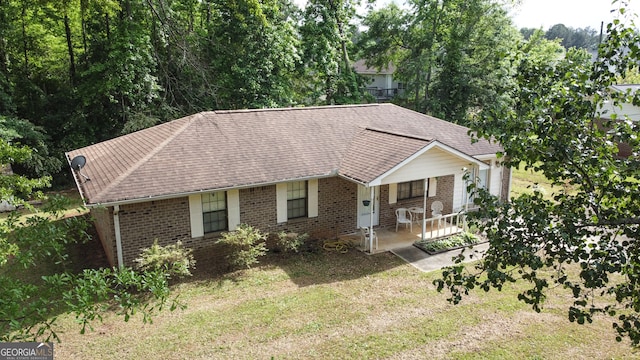 ranch-style house featuring covered porch