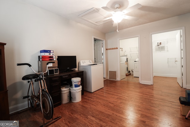 office area featuring hardwood / wood-style floors, ceiling fan, and washer / clothes dryer