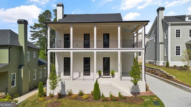 view of front of house with a balcony